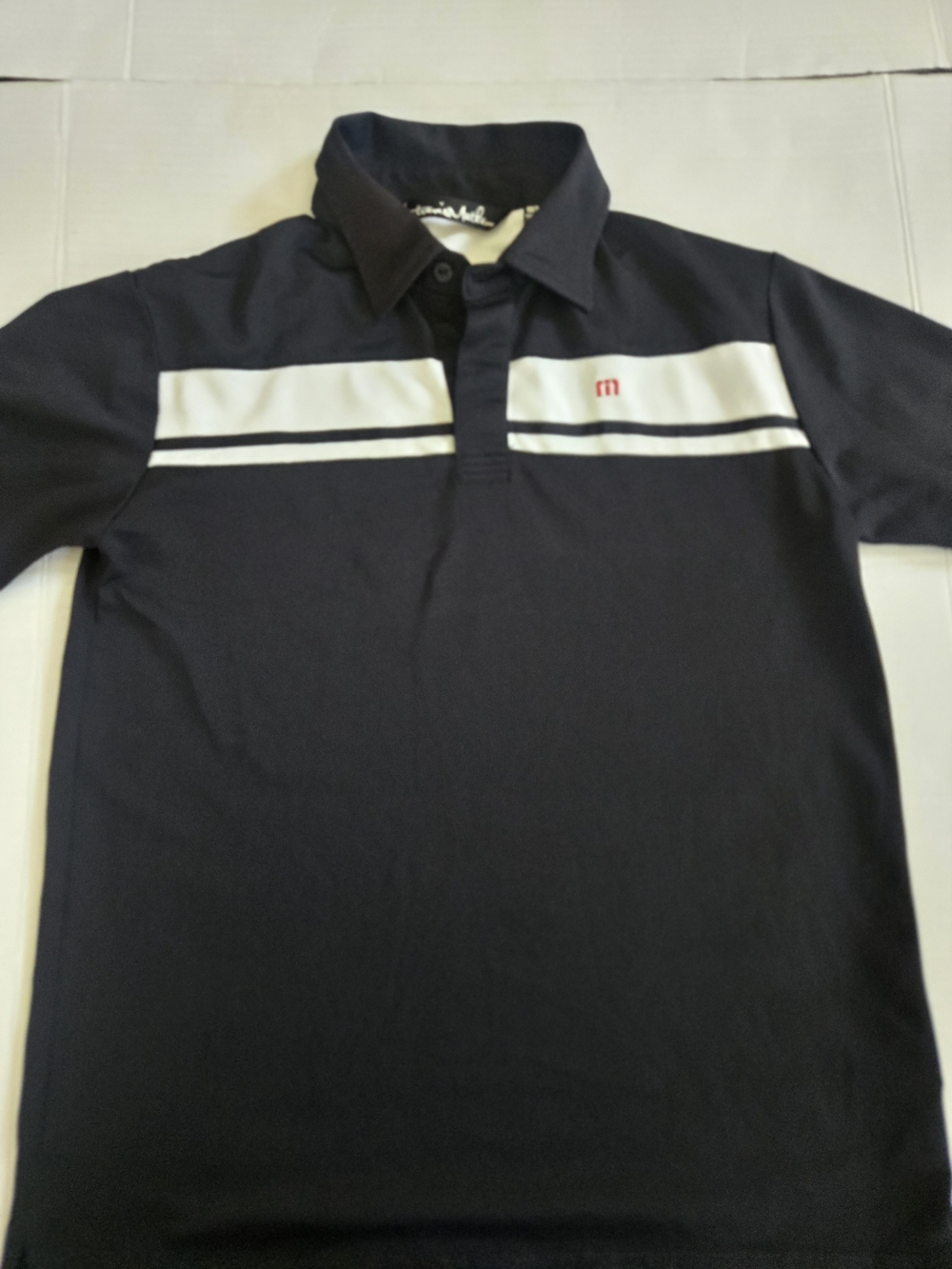 Travis Mathew Navy Polo with White Chest Stripe and Red Logo Kids Size M